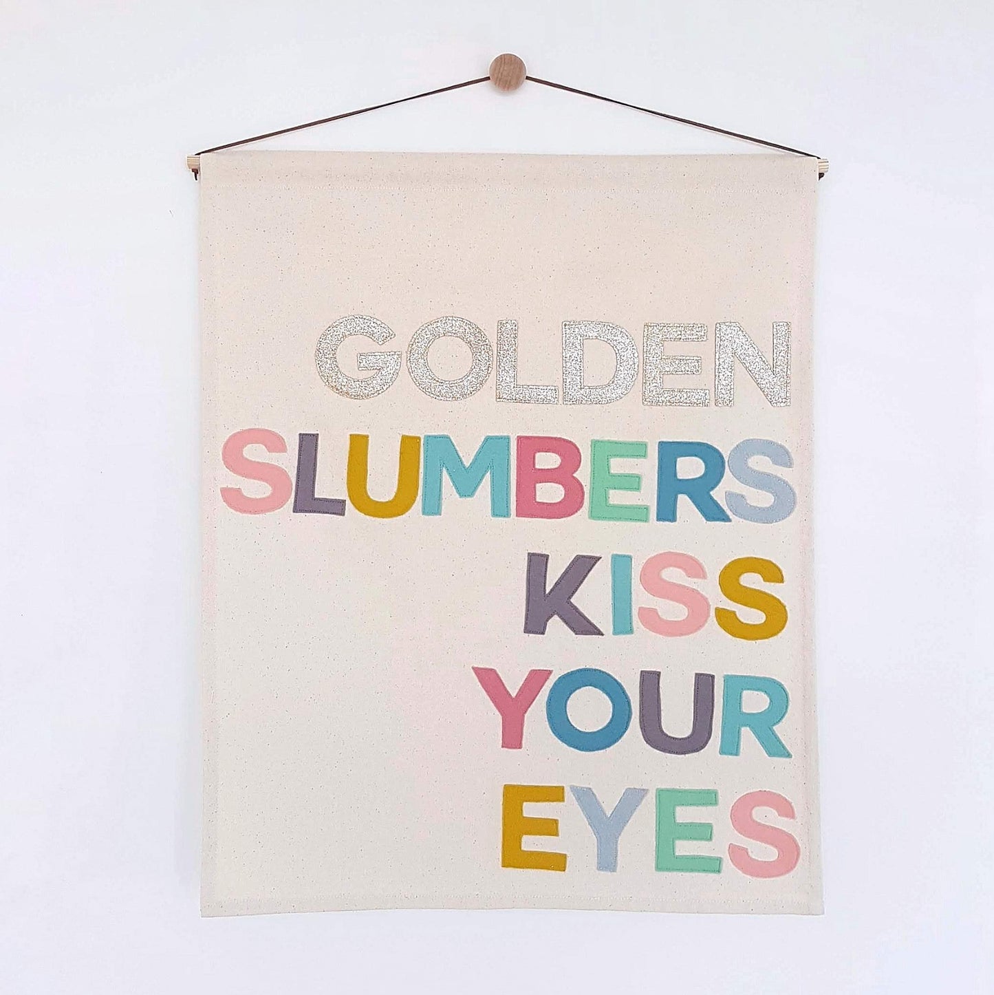 Golden slumbers kiss your eyes wall hanging