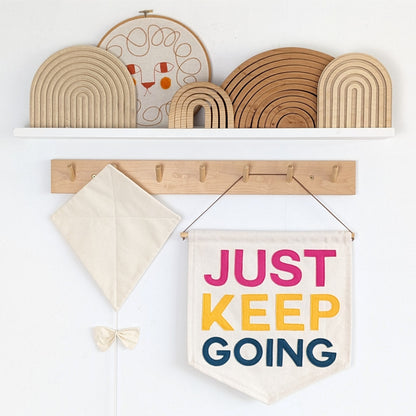 Just Keep Going wall hanging in custom colours.