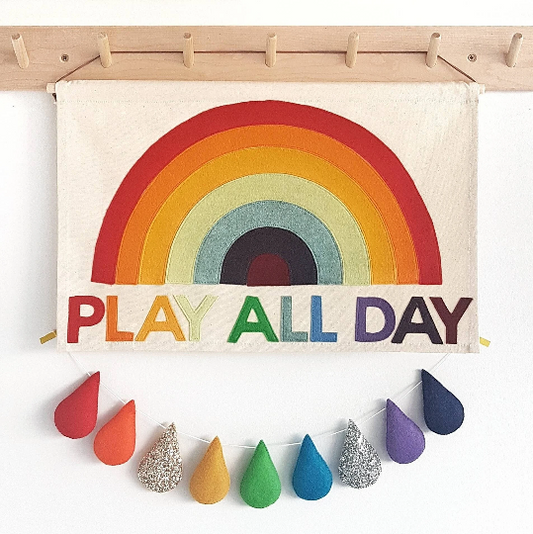 Play All Day wall hanging with rainbow