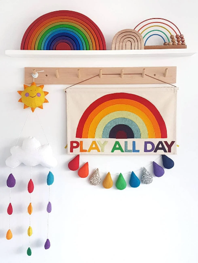 Play All Day wall hanging with rainbow