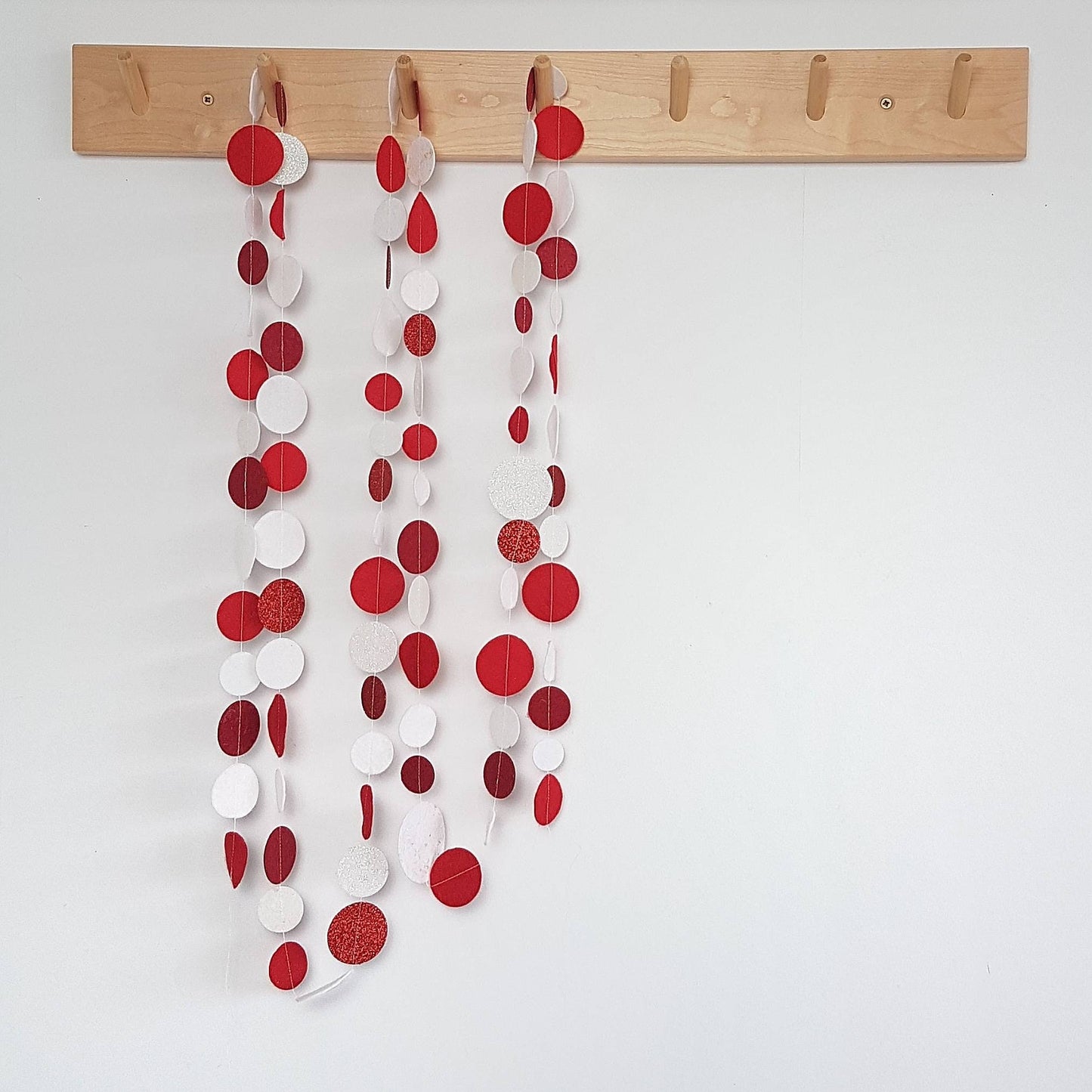 Christmas spotty felt garland in a variety of colourways