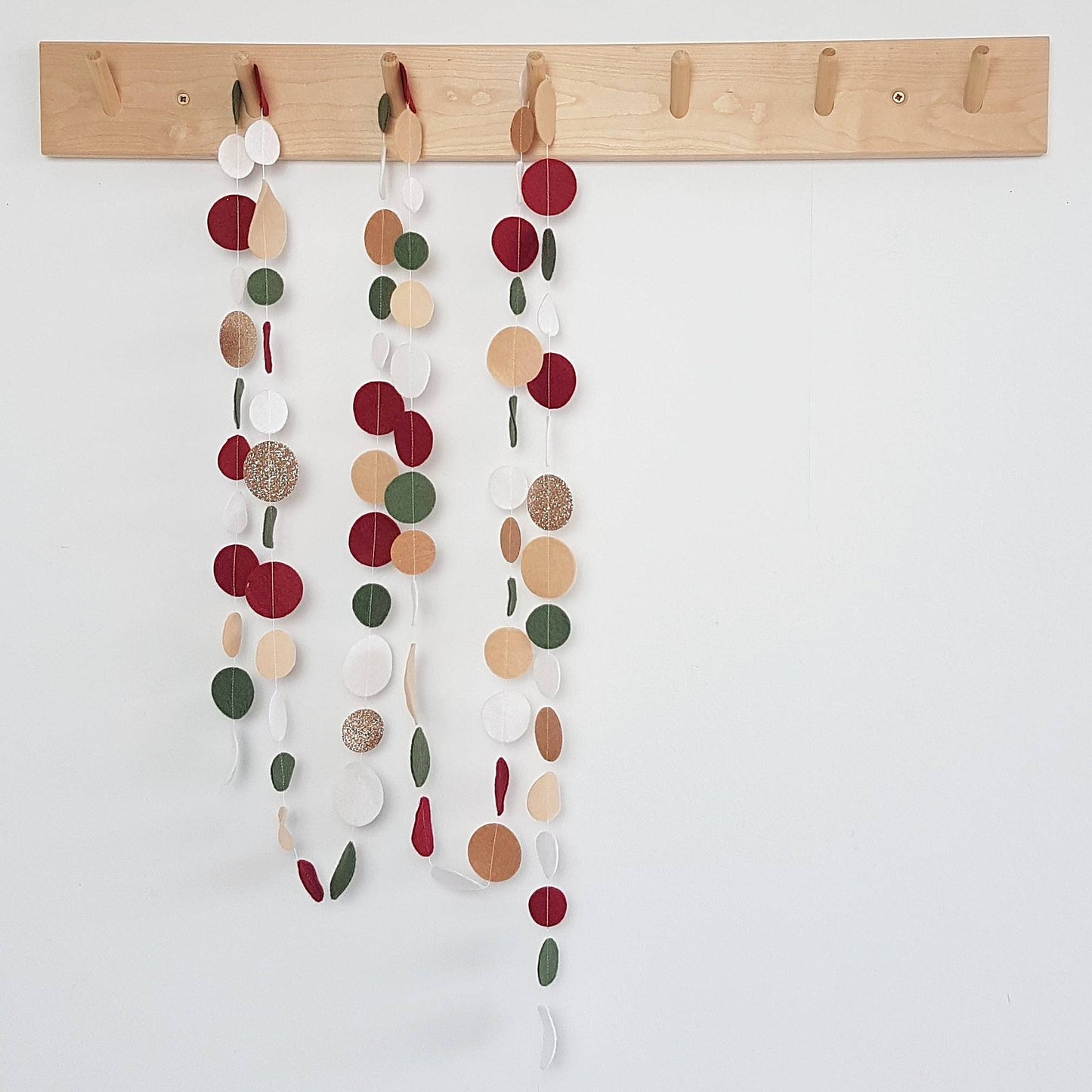 Christmas spotty felt garland in a variety of colourways