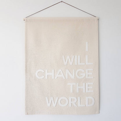 We/I will change the world banner in bold single colour text