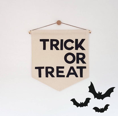 Trick or Treat banner, wall hanging in simple black text