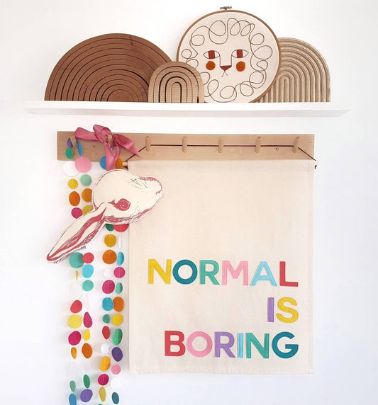 Normal is Boring banner